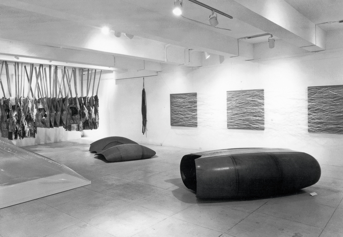 [FIG. 8], Eva Hesse&rsquo;s Several, 1965, and Metronomic Irregularity II, 1966 (both on back wall) in Eccentric Abstraction at